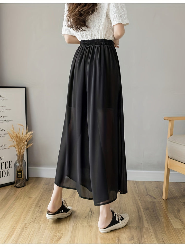 Caexine | Weit geschnittene Hose mit Falten und elegantem Schnitt