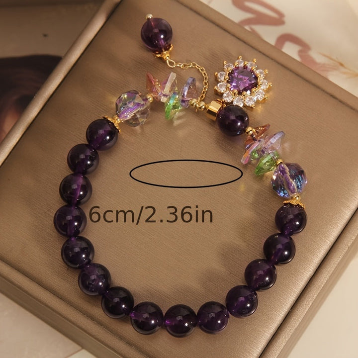 Winter | Armband aus lila Perlen mit glänzendem Anhänger