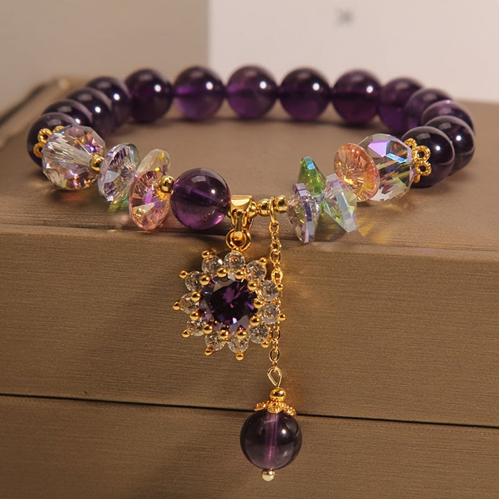 Winter | Armband aus lila Perlen mit glänzendem Anhänger