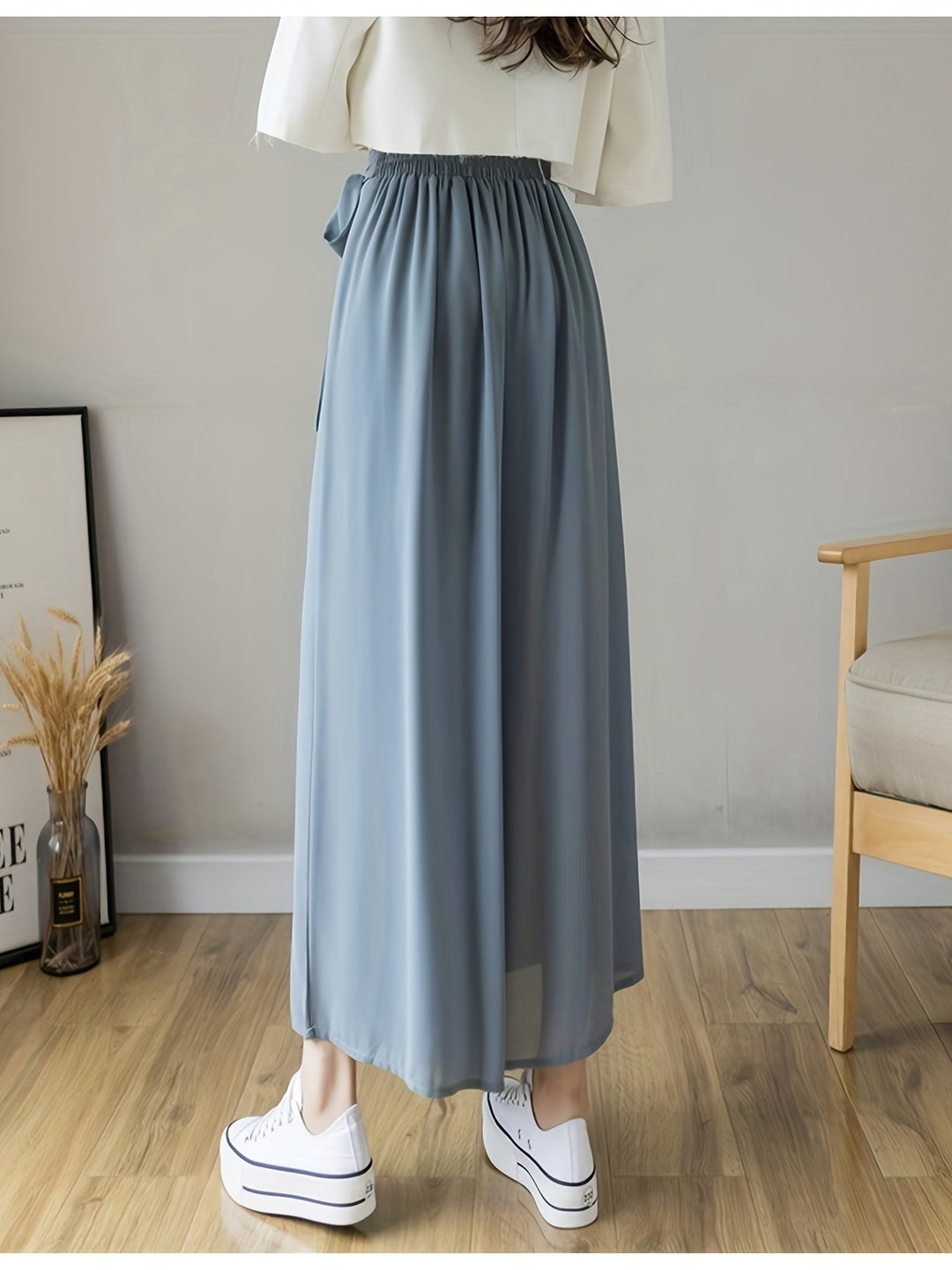 Caexine | Weit geschnittene Hose mit Falten und elegantem Schnitt