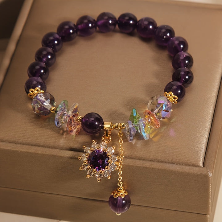 Winter | Armband aus lila Perlen mit glänzendem Anhänger