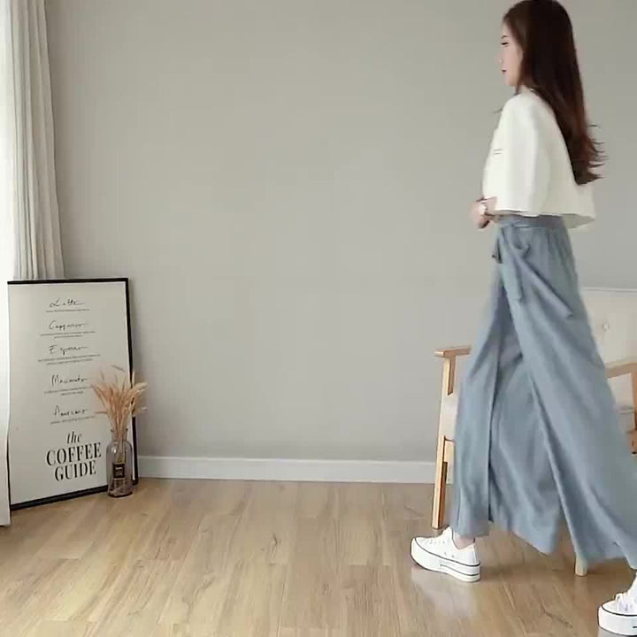 Caexine | Weit geschnittene Hose mit Falten und elegantem Schnitt