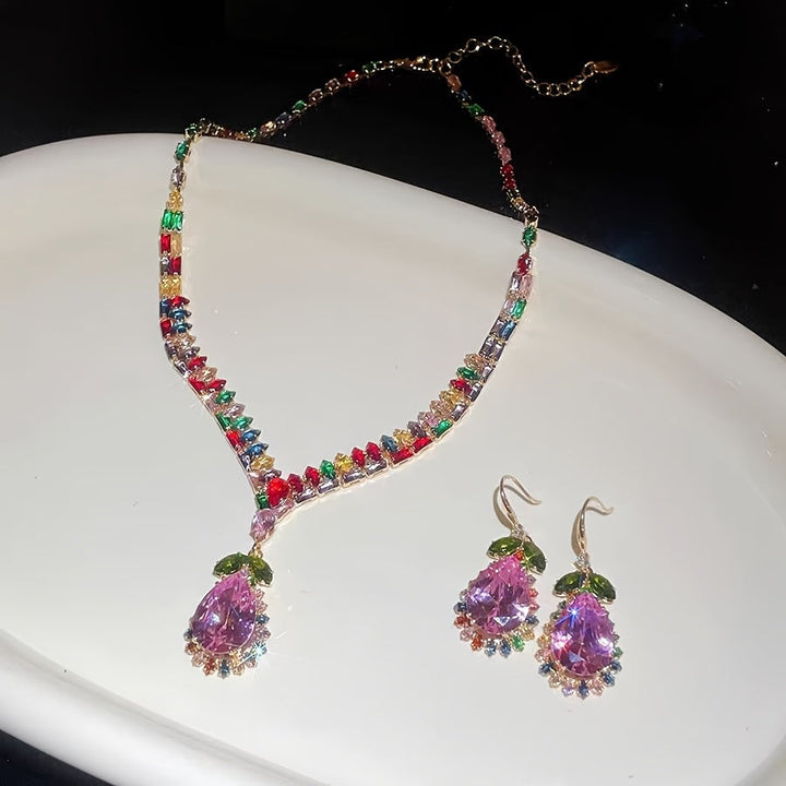 Quothex | Set aus Halskette und Ohrringen mit eleganten, mehrfarbigen Tropfen-Design