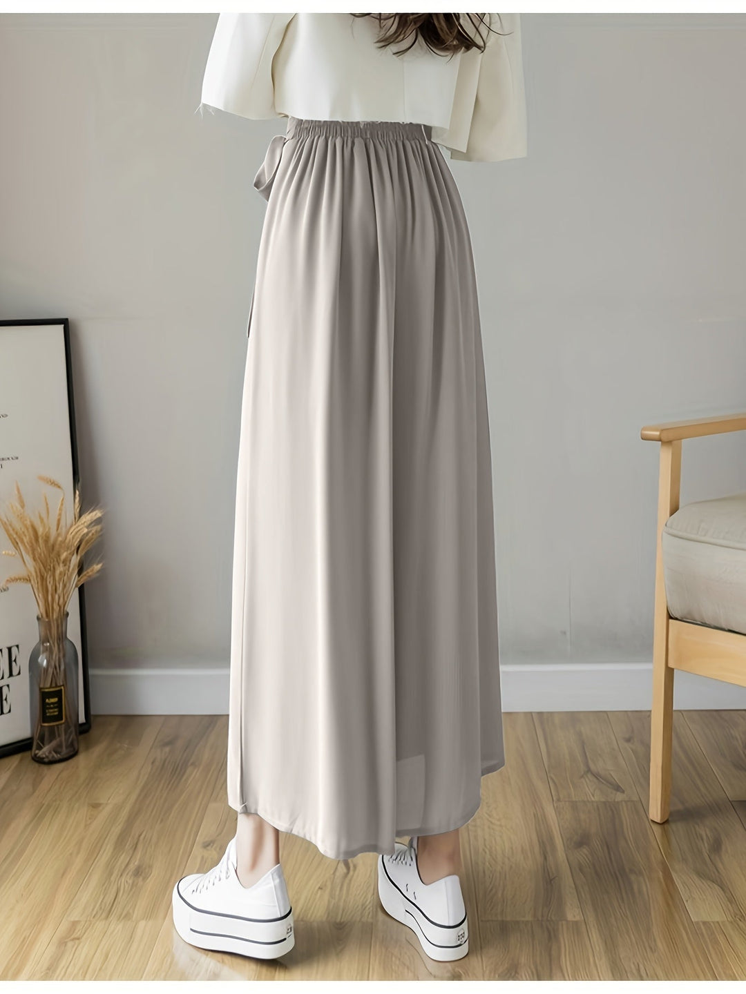 Caexine | Weit geschnittene Hose mit Falten und elegantem Schnitt