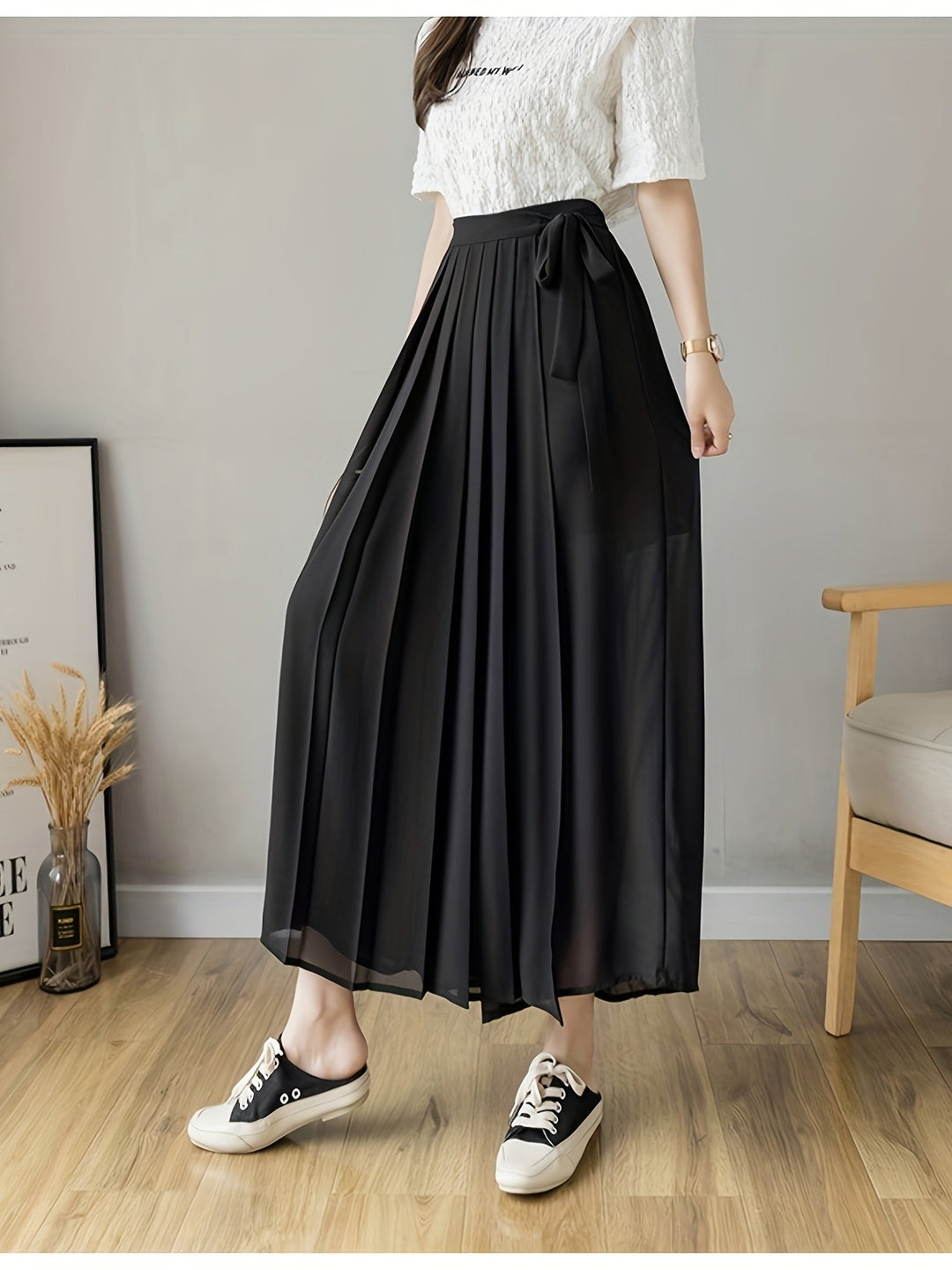 Caexine | Weit geschnittene Hose mit Falten und elegantem Schnitt