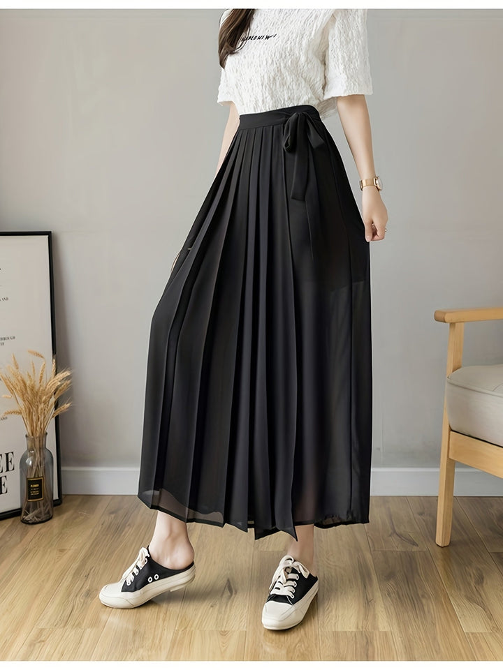 Caexine | Weit geschnittene Hose mit Falten und elegantem Schnitt
