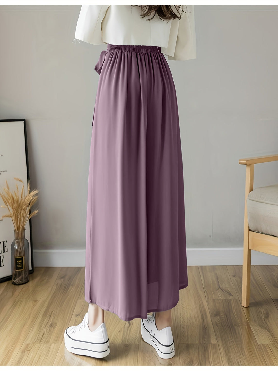 Caexine | Weit geschnittene Hose mit Falten und elegantem Schnitt