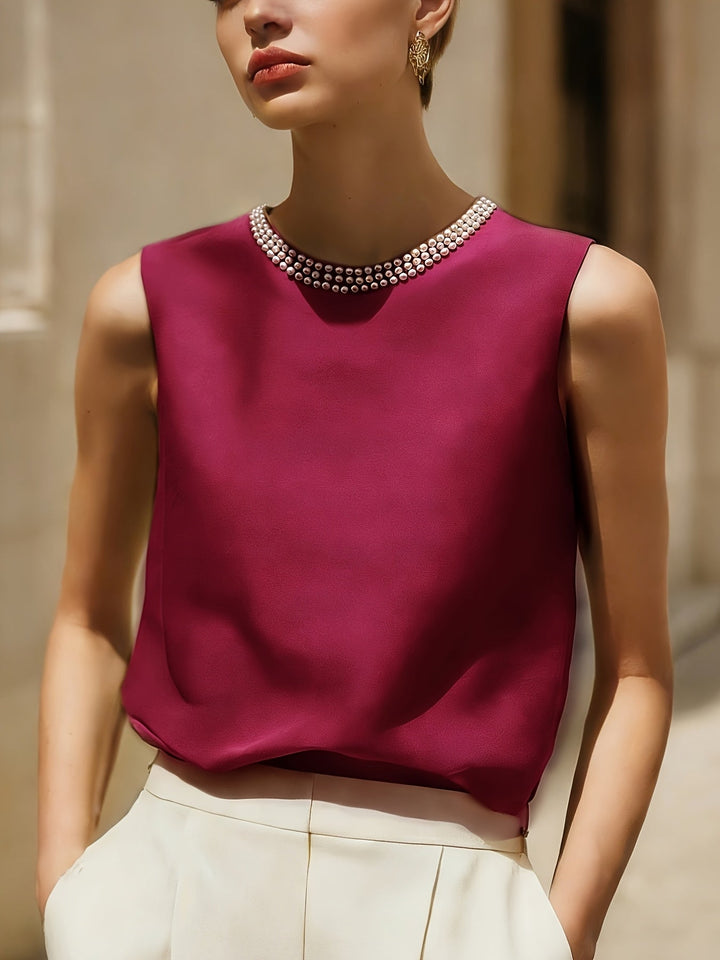 Sythove | Ärmellose Bluse mit dekorativen Perlen und elegantem Stil