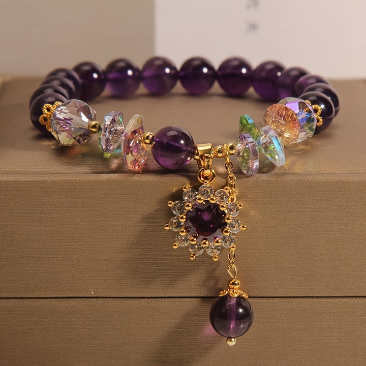 Winter | Armband aus lila Perlen mit glänzendem Anhänger