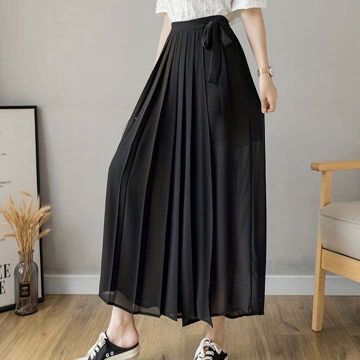 Caexine | Weit geschnittene Hose mit Falten und elegantem Schnitt