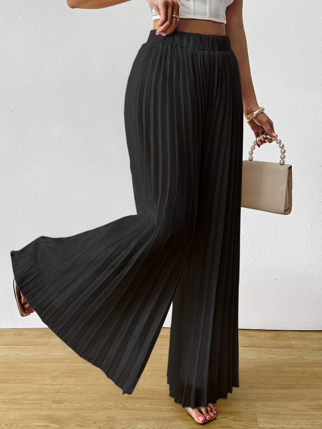 Uliquin | Plissierte weit geschnittene Hose mit elastischem Bund und elegantem Fall