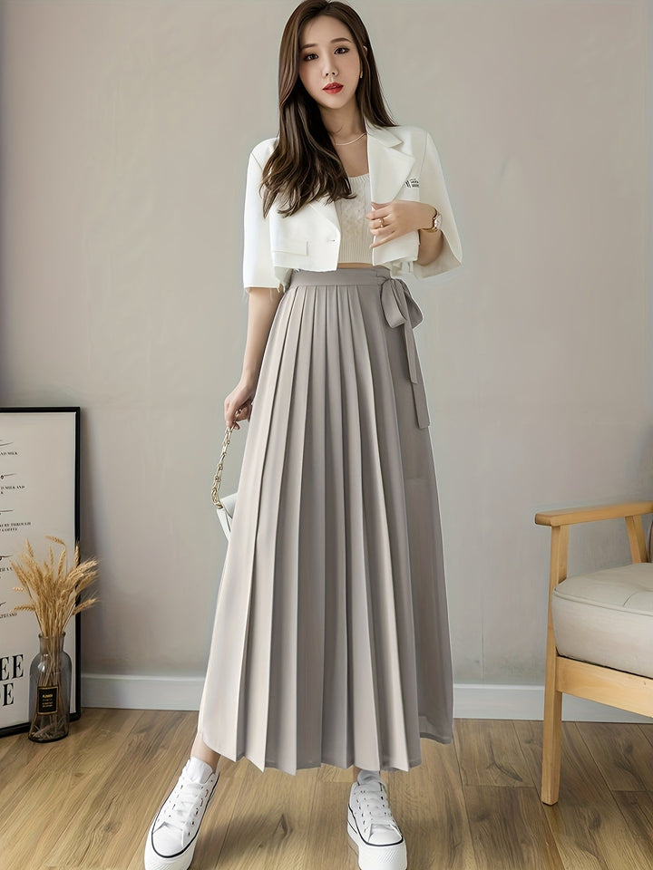 Caexine | Weit geschnittene Hose mit Falten und elegantem Schnitt