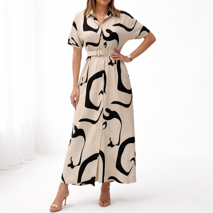 Jolira | Elegantes tailliertes Kleid mit unregelmäßigem Muster