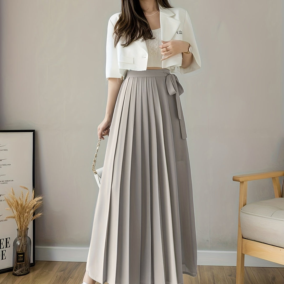 Caexine | Weit geschnittene Hose mit Falten und elegantem Schnitt
