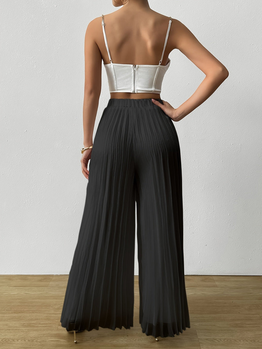 Uliquin | Plissierte weit geschnittene Hose mit elastischem Bund und elegantem Fall