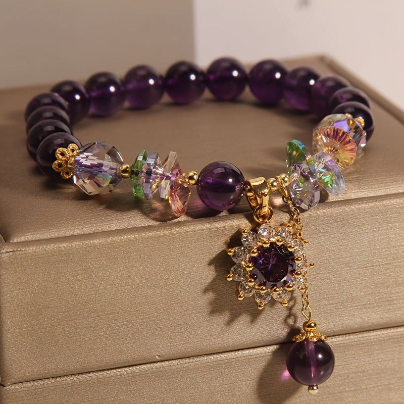 Winter | Armband aus lila Perlen mit glänzendem Anhänger