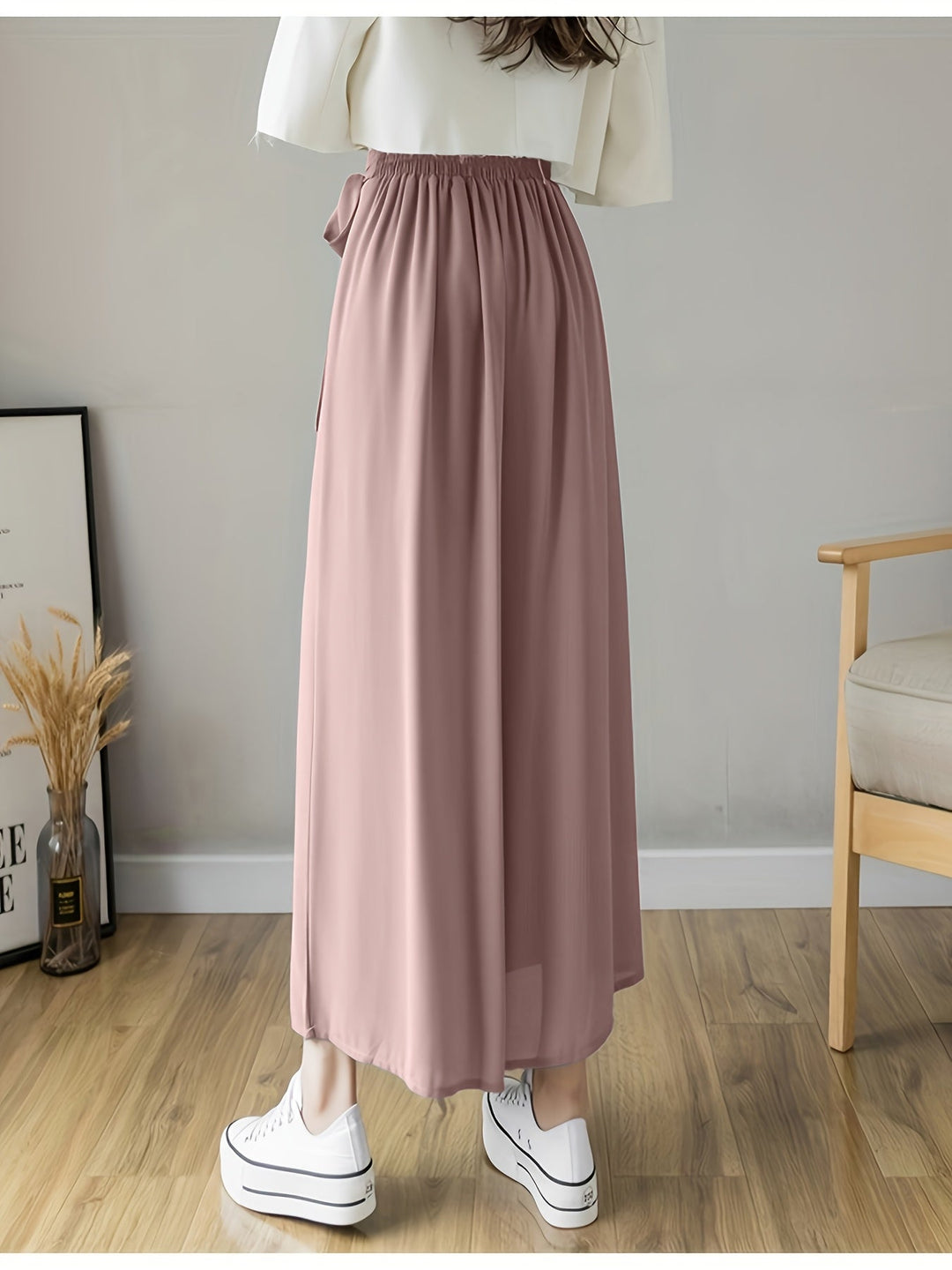 Caexine | Weit geschnittene Hose mit Falten und elegantem Schnitt