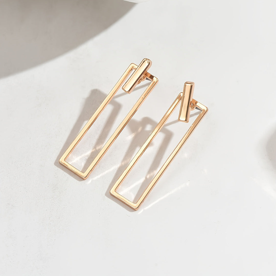 Quinleyra | Lange geometrische Ohrringe mit elegantem Metallic-Finish