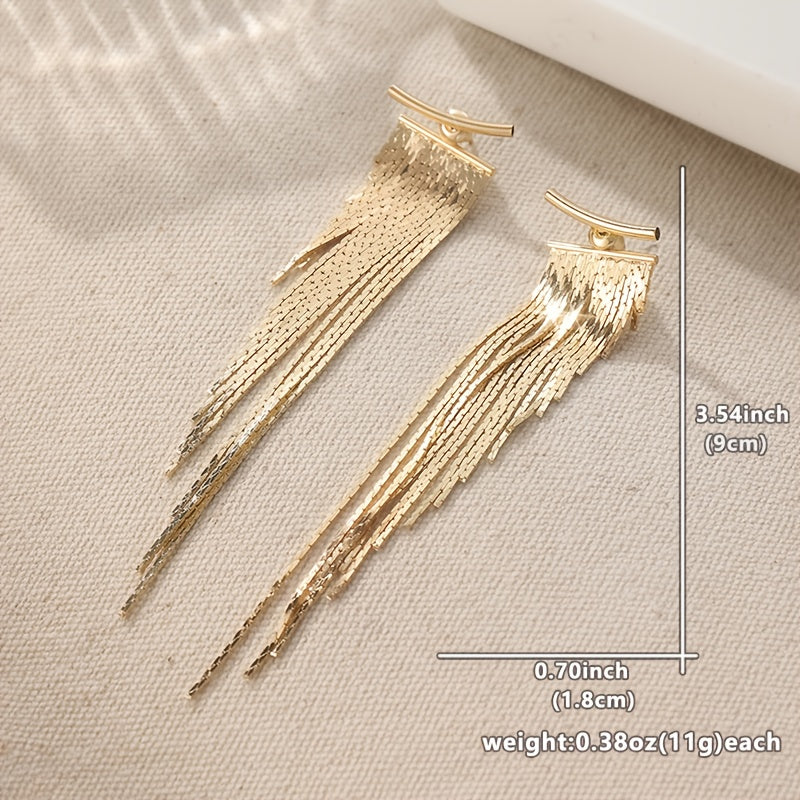 Diana | Goldene Ohrringe mit Quasten und Blätter-Design in Cascade